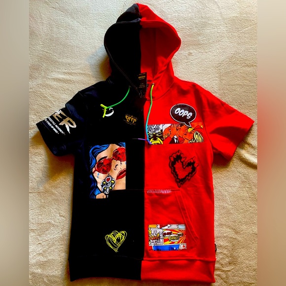 I'm selling a brand new sweater, black and red really nice designs - Picture 1 of 4